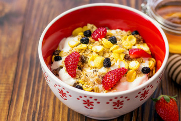 Muesli With Dried Fruit, Strawberries and Milk