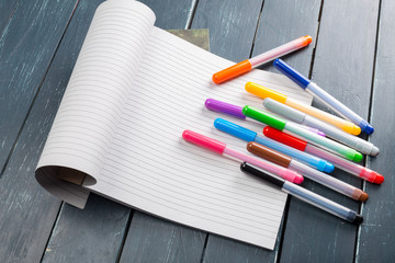 clean sheets on table with markers