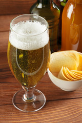 Glass of beer and beer bottle