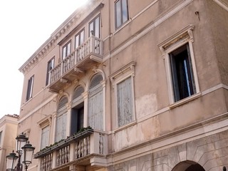 Fototapeta na wymiar Facade and windows in Chioggia, Italy