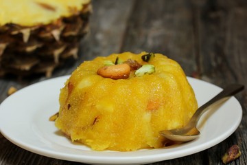 Pineapple Kesari -  Semolina pudding, selective focus