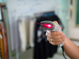 barcode scanner  in woman's hand