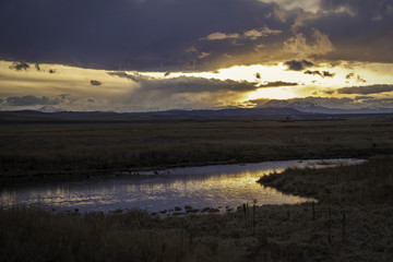 Mountains at sunset with reflection