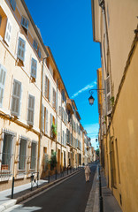 Fototapeta na wymiar Typical narrow street in Aix en Provence, France
