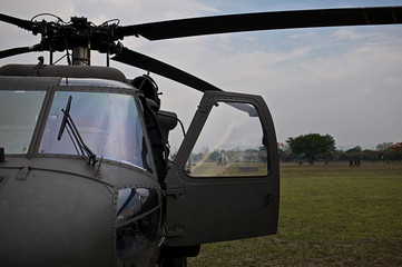 Fototapeta na wymiar Front view of military helicopter cockpit