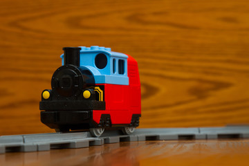 Fototapeta premium toy train rides on rails