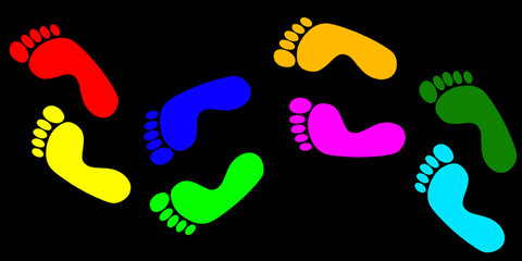 Colorful footprints on black background