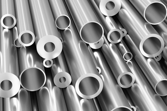 Many different steel pipes closeup, industrial background