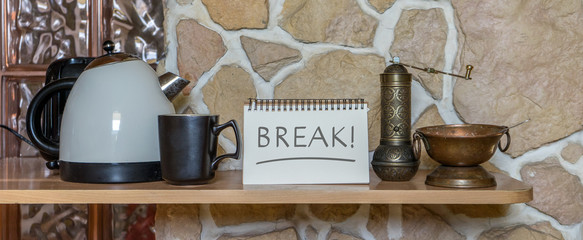 coffee break / Water cooker, cup and notepad with text break