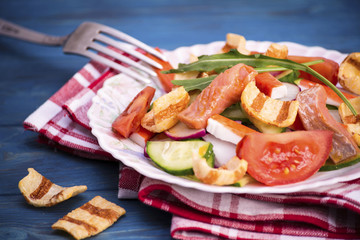 Salad with vegetables and red fish