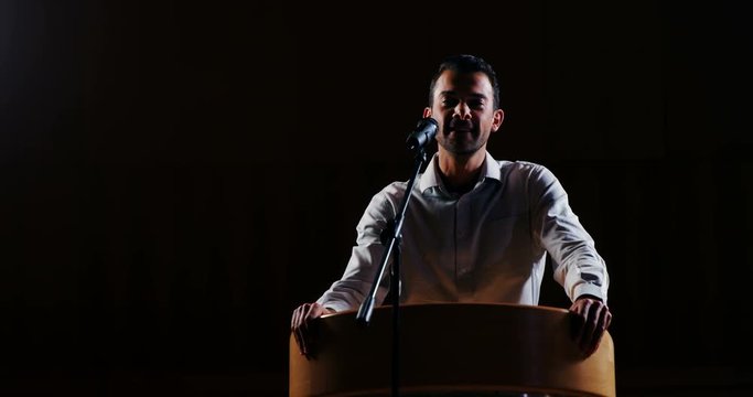 Business executive giving a speech