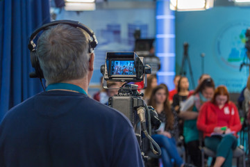 Cameraman shooting instudio