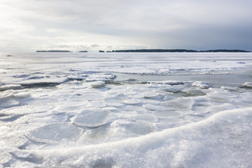 Snowy winter landscape at frozen sea
