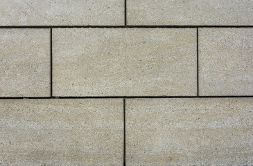 Background of wall from a large facade of brick.