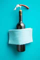 Bottle of wine with corkscrew.