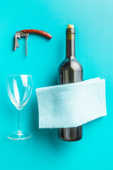 Bottle of wine with corkscrew.