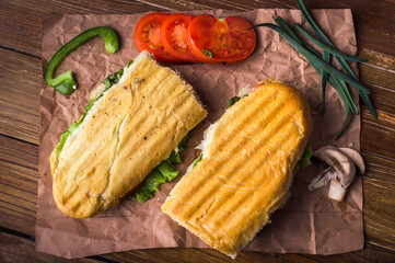 Panini on a wooden background