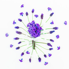 Bouquet of hyacinth flowers with tapes and pattern of muscari flowers on white background. Flat lay, top view.