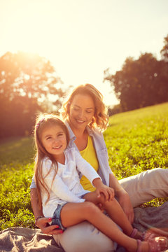Mother and daughter on picnic