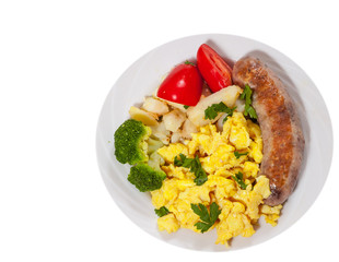 Scrambled egg with sausage and vegetables. top view. isolated on white