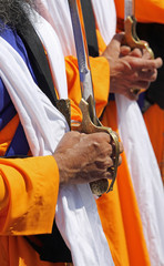 hands of the Sikh religious men during the ceremony