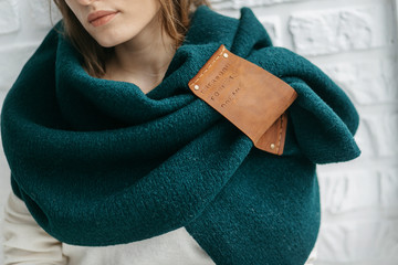 Winter warm scarf around the neck of the girl