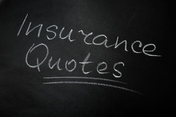 Obraz premium Text INSURANCE QUOTES written on blackboard background