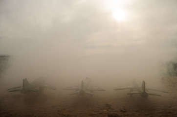 fighter jets parked in the base on sunset