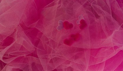 hearts aspire on a red background. Concept of love, St. Valentine's Day, lovers. Flat fly