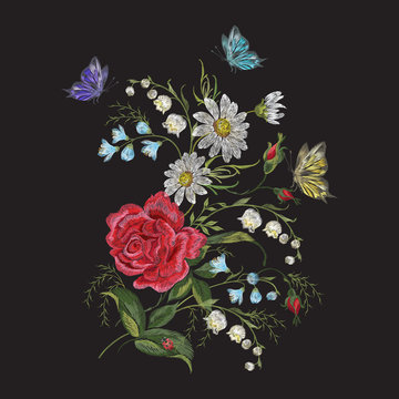Embroidery brigt trend floral pattern with butterfly. Vector traditional folk roses, lilies and forget me not flowers bouquet on black background for clothing design.