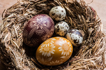 decorated easter eggs in nest
