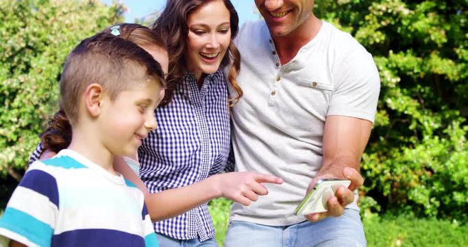 Happy family using mobile