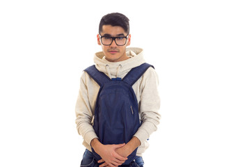 Young man with glasses and backpack