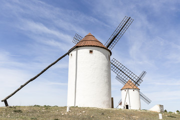 Fototapeta na wymiar white windmills in Mota del Cuervo, Province of Cuenca, Castilla La Mancha, Spain