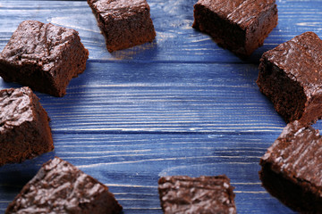 Delicious chocolate cake on wooden table