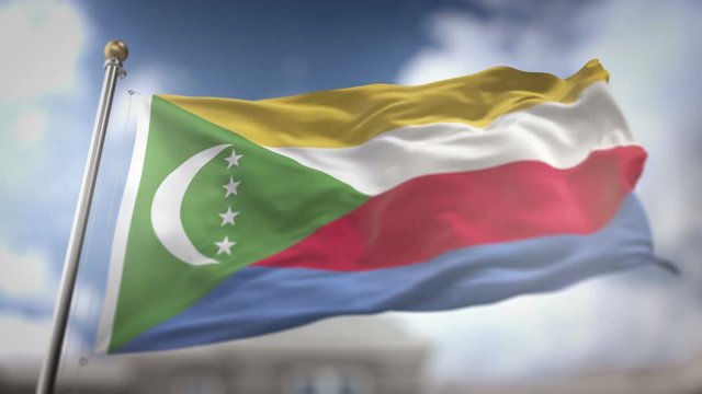 Comoros Flag Waving Slow Motion 3D Rendering Blue Sky Background - Seamless Loop 4K