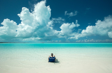 Fototapeta na wymiar Man at Sandy Cay, Bahamas