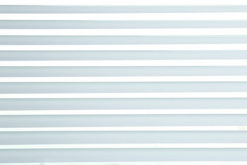 Window with white jalousie, closeup