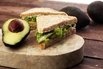 sliced avocado on toast bread with spices and avocado