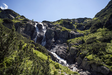 Polish mountains valley of five lakes. National Park in Zakopane. Great Waterfall Waterfall