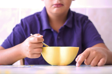 Boy Is Eating Chocolate Corn Flakes