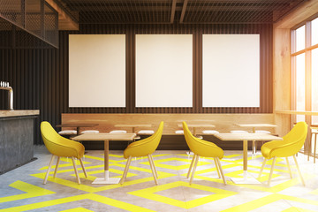 Cafe with posters, yellow, toned