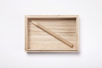 woman hand hold a wood gift box with pencil isolated white.