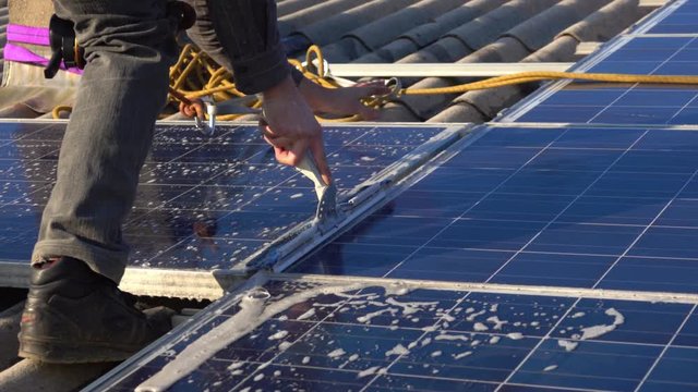 High Rise Window Cleaner cleaning Photovoltaic System