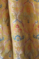 Yellow Brocade Curtain in a Tibetan Monastery in Qinghai China Asia