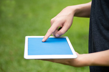 man holding a tablet