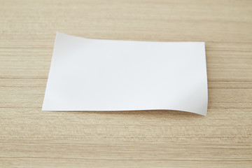 white blank paper on wood