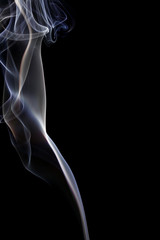 Abstract white blue smoke from aromatic sticks.