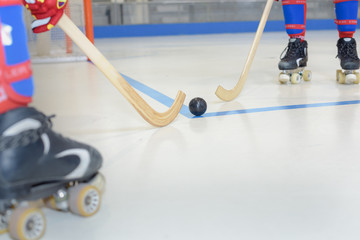 playing roller hockey