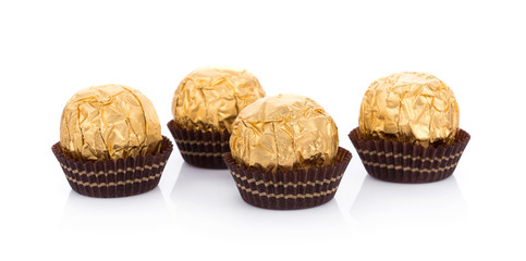 Chocolate balls on white background